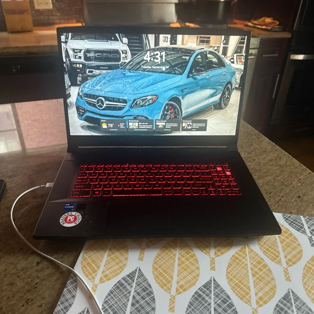 MSI Black Laptop with Red Keyboard